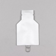 two white die-cut dispenser tip pouches