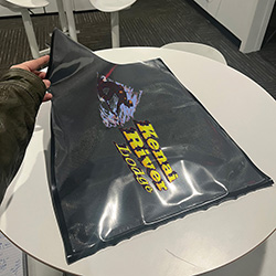 black and clear vacuum bag with shipping logo printed on it